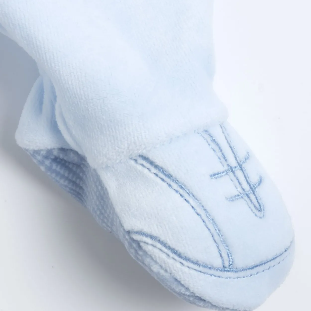 Completo maglia e pantaloni con piedini