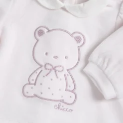 Completo maglia e pantaloni con piedini