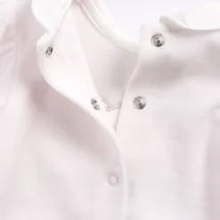 Completo maglia e pantaloni con piedini