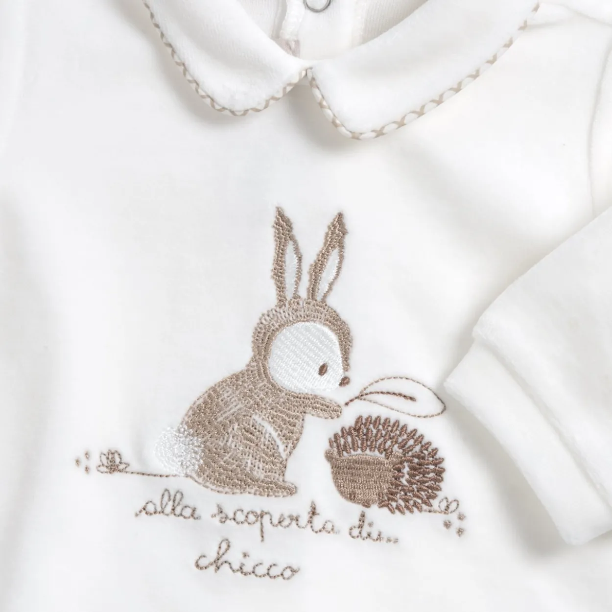 Completo maglia e pantaloni con piedini