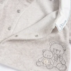 Completo maglia e pantaloni con piedini