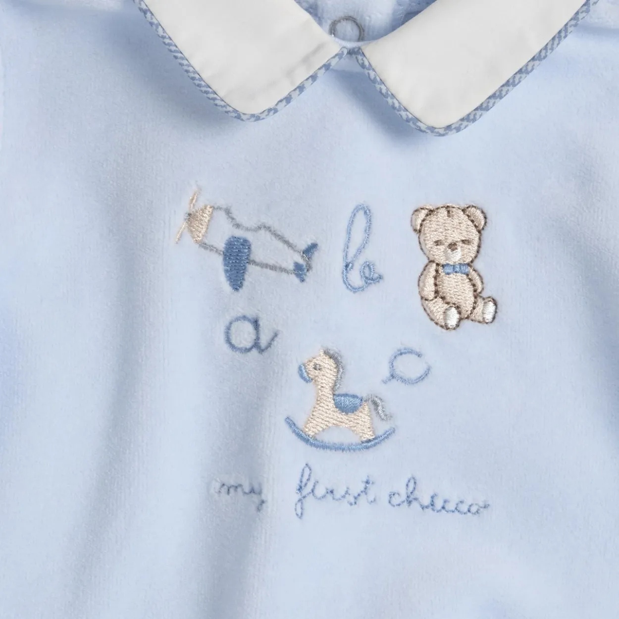 Completo maglia e pantaloni con piedini