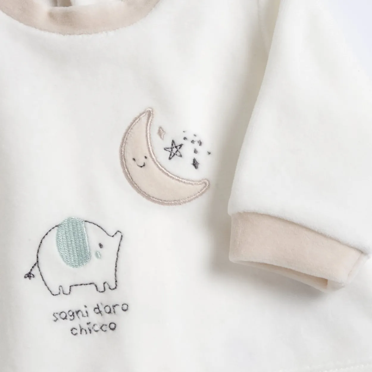 Completo maglia e pantaloni con piedini