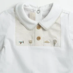 Completo maglia e pantaloni con piedini
