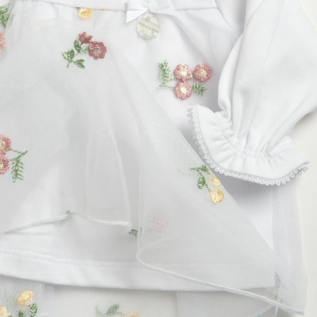 Completo maglia e pantaloni con piedini