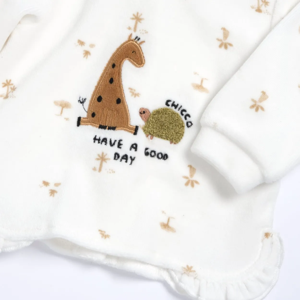 Completo maglia e pantaloni con piedini